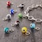 12 Packs: 9 ct. (108 total) Glass Evil Eye Charms by Bead Landing™